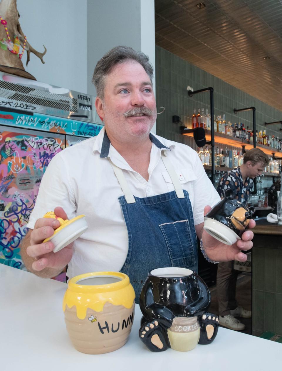 Chef/owner Blake Rushing talks about the cookie jars used for dessert at the new location of the Union Public House at 36 East Garden Street in Pensacola on Friday, Aug, 25, 2023.