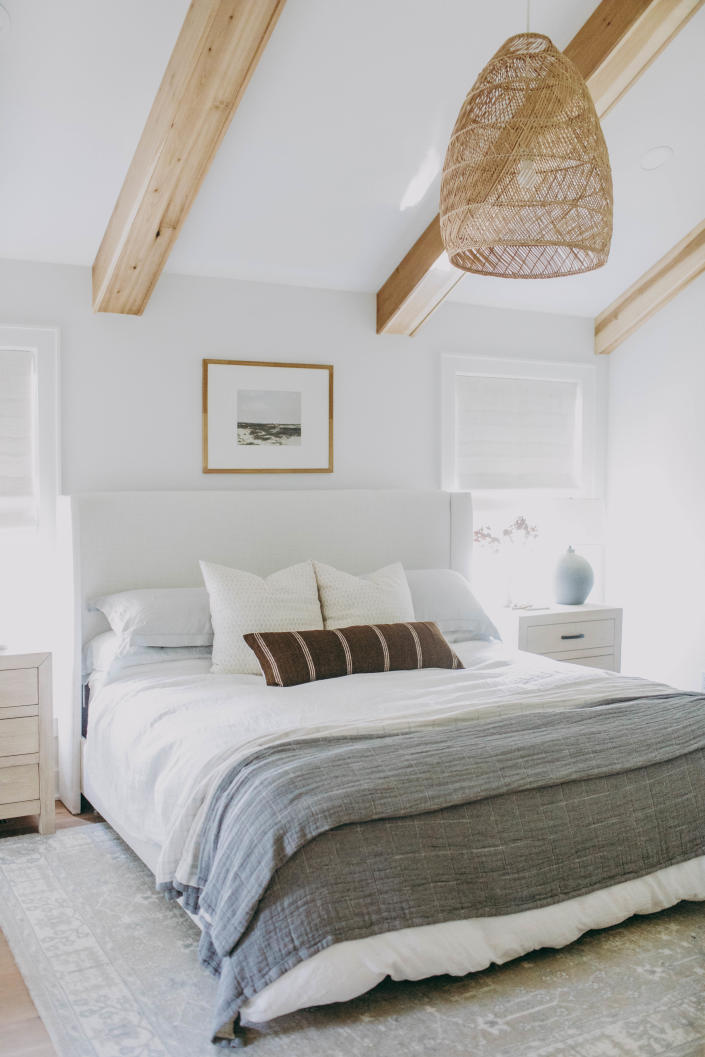 This Gable Interiors bedroom demonstrates that the bed can anchor the entire room.