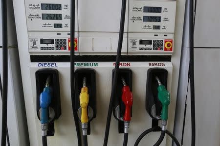 Oil pumps are seen at a MAX oil station in Yangon April 21, 2014. REUTERS/Soe Zeya Tun