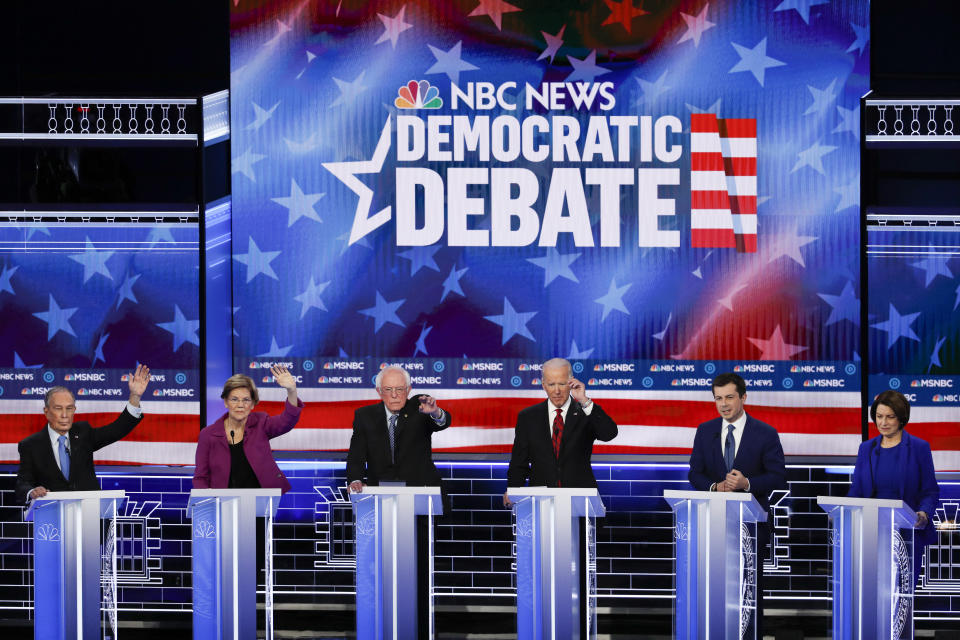 From left, Democratic presidential candidates, former New York City Mayor Mike Bloomberg, Sen. Elizabeth Warren, D-Mass., Sen. Bernie Sanders, I-Vt., former Vice President Joe Biden, former South Bend Mayor Pete Buttigieg, Sen. Amy Klobuchar, D-Minn., participate in a Democratic presidential primary debate Wednesday, Feb. 19, 2020, in Las Vegas, hosted by NBC News and MSNBC. (AP Photo/John Locher)