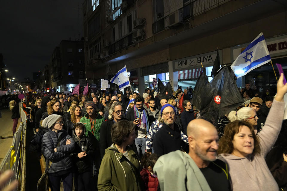 Protesters march in Tel Aviv, Israel, against Prime Minister Benjamin Netanyahu's far-right government, Saturday, Jan. 7, 2023. (AP Photo/ Tsafrir Abayov)