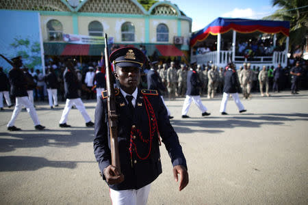 Members of the Haitian Armed Forces (FAD'H) parade in the streets of Cap-Haitien, Haiti, November 18, 2017. REUTERS/Andres Martinez Casares