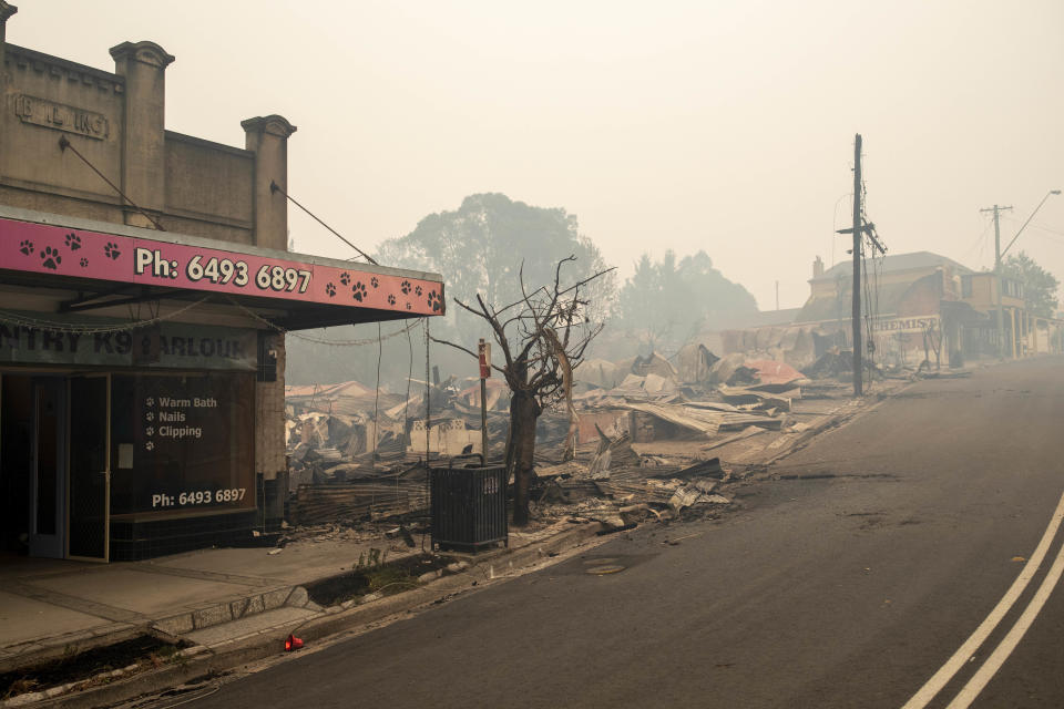 Buildings destroyed by fire are seen on the Main Street in Cobargo, NSW, Wednesday, January 1, 2020.