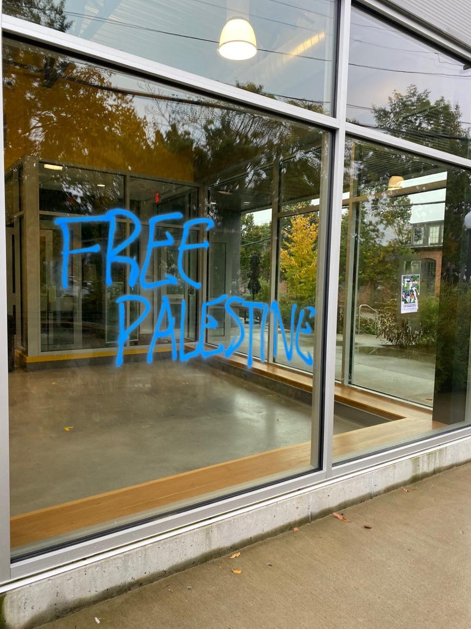 The Providence police are looking for the public's help in identifying the people who painted "Free Palestine" on the Farm Fresh Rhode Island's building on Oct. 21.