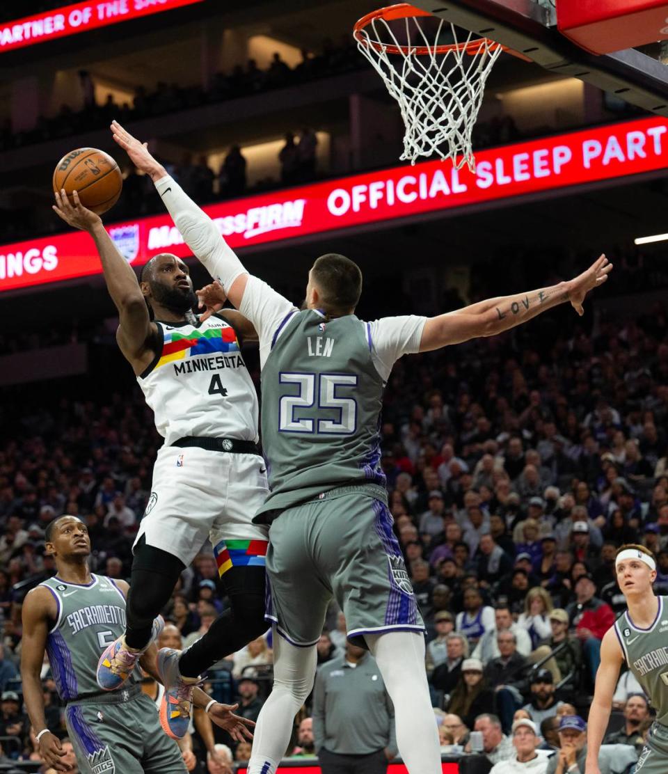 Minnesota Timberwolves guard Jaylen Nowell (4) shoots over Sacramento Kings center Alex Len (25) for a basket in the fourth quarter during a game at Golden 1 Center in Sacramento, Monday, March 27, 2023.