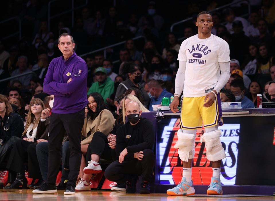 The trade for Russell Westbrook (left) looms as a major factor in the Lakers' middling season, but coach Frank Vogel may end up paying the price.