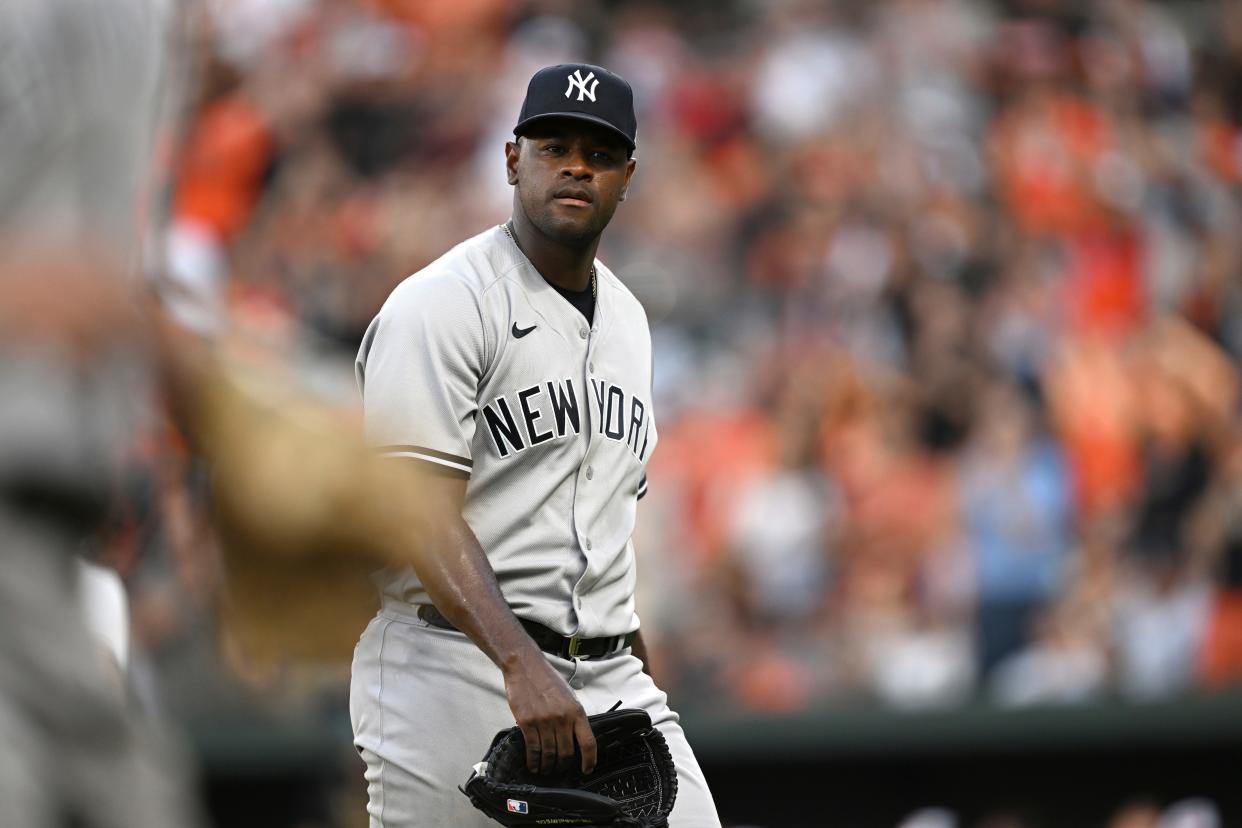 New York Yankees pitcher Luis Severino walks to the dugout after giving up seven runs to the Baltimore Orioles in the first inning of a baseball game Sunday, July 30, 2023, in Baltimore. (AP Photo/Gail Burton)