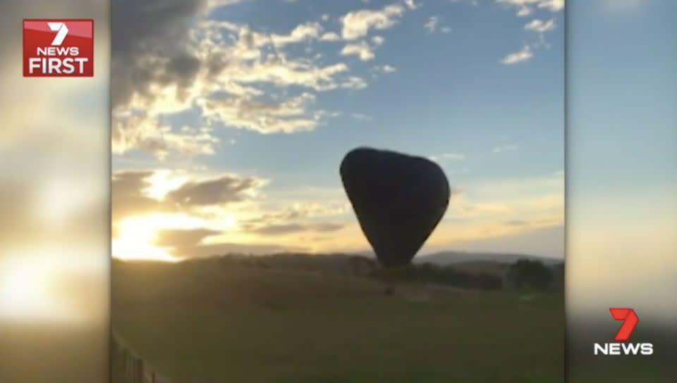 The hot air balloon crashes to the ground. Source: 7 News
