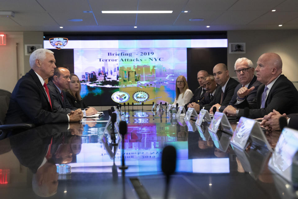 Vice President Mike Pence, left, meets with James O'Neill, right, New York Police Department Commissioner, and staff Thursday, Sept. 19, 2019 for a counterterrorism meeting. (AP Photo/Mark Lennihan)