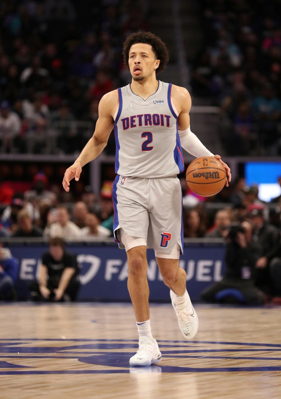 Detroit Pistons guard Cade Cunningham (2) brings the ball up court against the Philadelphia 76ers during second quarter action on Thursday, March 31, 2022, at Little Caesars Arena in Detroit.