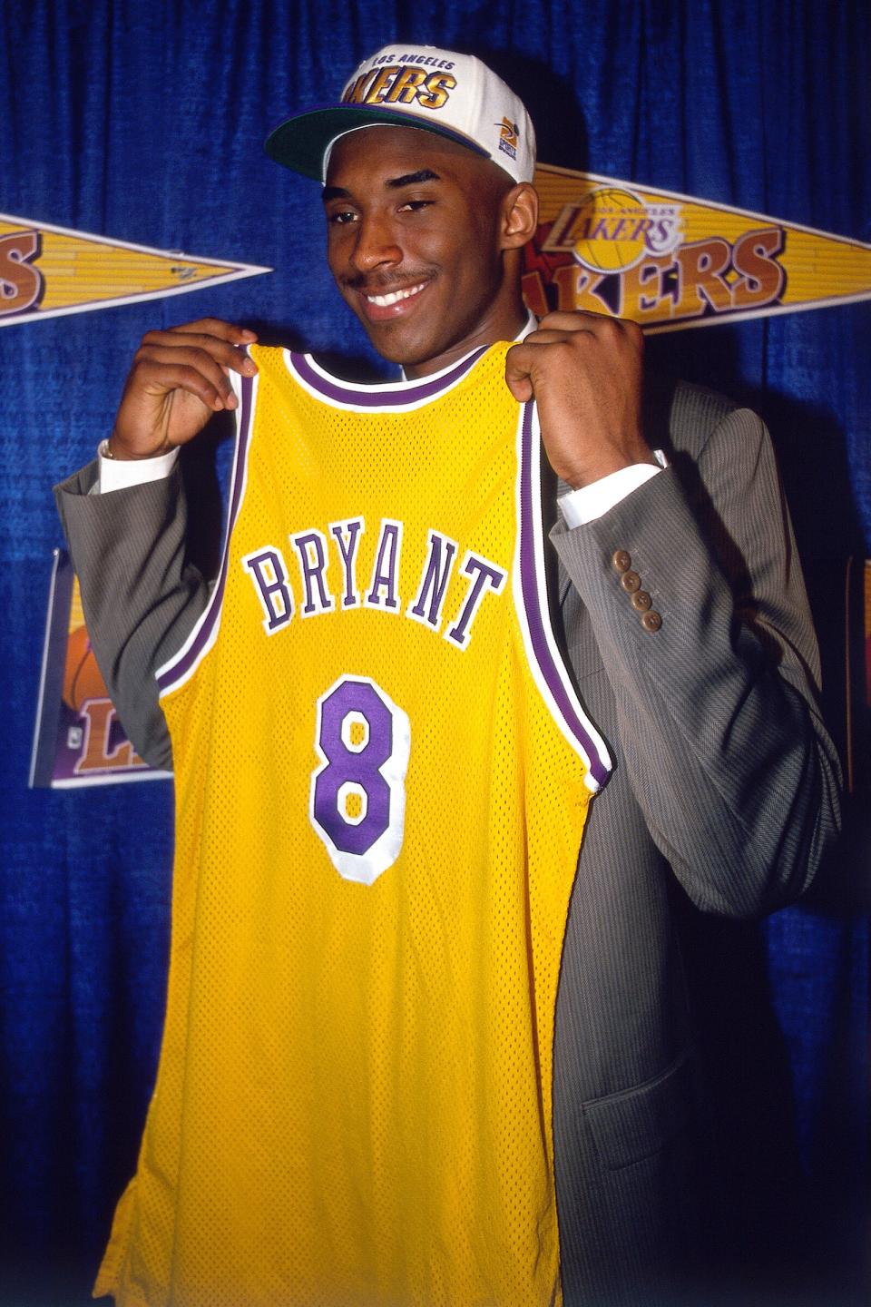 A standout athlete as a teen at Lower Merion High School, Bryant decided to enter the NBA straight out of 12th grade. He was the 13th overall pick in the 1996 NBA Draft, by the Charlotte Hornets, who traded his draft rights to the Los Angeles Lakers in a prior agreement.