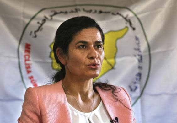 Ilham Ahmed has been lobbying the US to broker an agreement between her group and Turkey over how to manage northeastern Syria once American troops withdraw (AP)