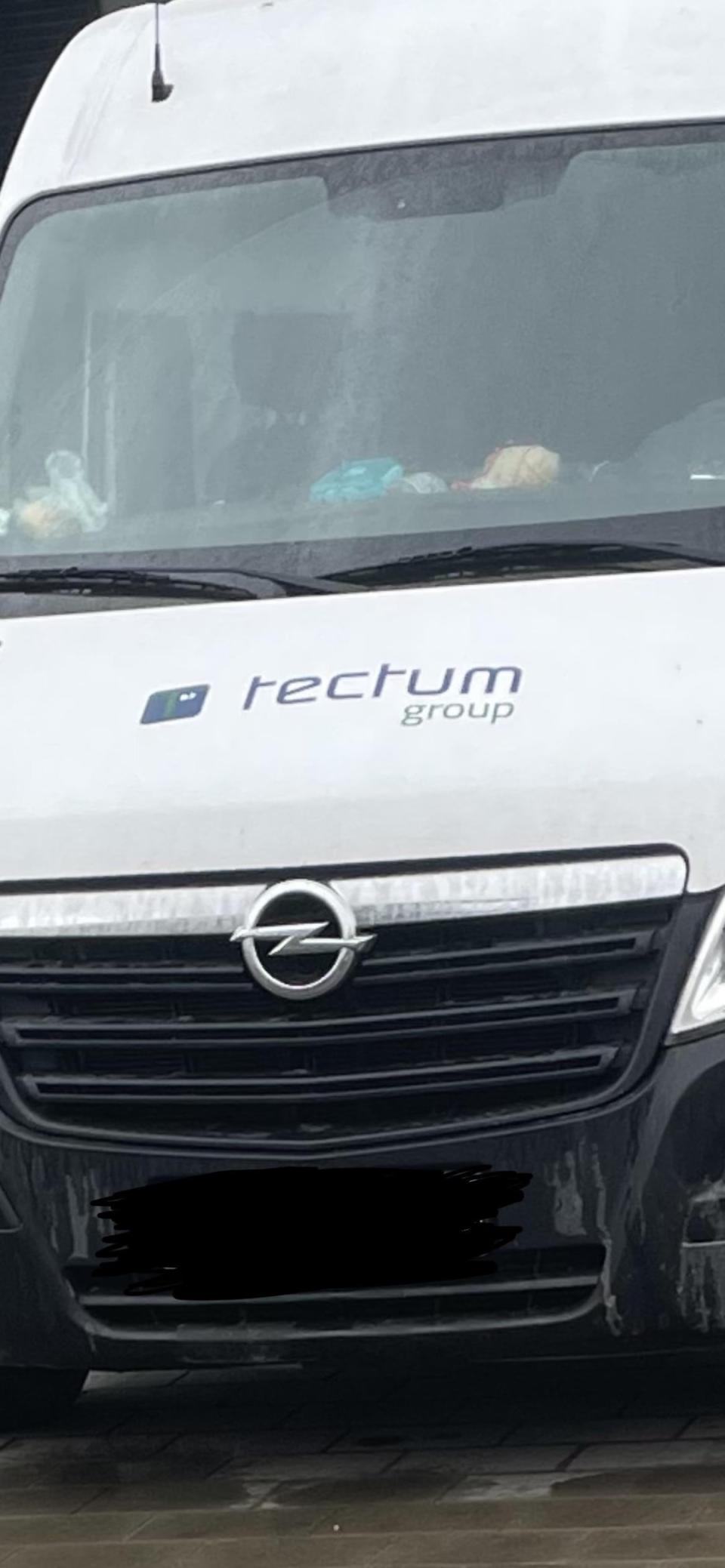 A van with the logo "tectum group" is displayed on the front, but it appears to read "rectum group" because of the oddly shaped t's in this font