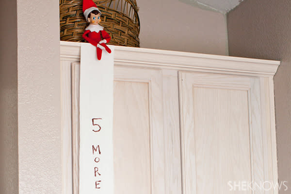 Elf on the Shelf idea 13: Elfie Rojo plays with toilet paper