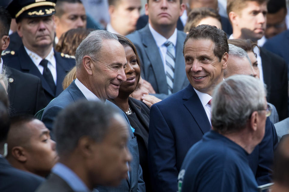 <p>Sen. Chuck Schumer, D-N.Y., speaks with New York Gov. Andrew Cuomo during a commemoration ceremony for the victims of the Sept. 11 terrorist attacks at the National September 11 Memorial, Sept, 11, 2017, in New York City. (Photo: Drew Angerer/Getty Images) </p>