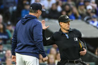 Seattle Mariners' manager Scott Servais is ejected by home plate umpire Brian Walsh during the sixth inning of the team's baseball game against the New York Yankees on Tuesday, May 30, 2023, in Seattle. (AP Photo/Caean Couto)