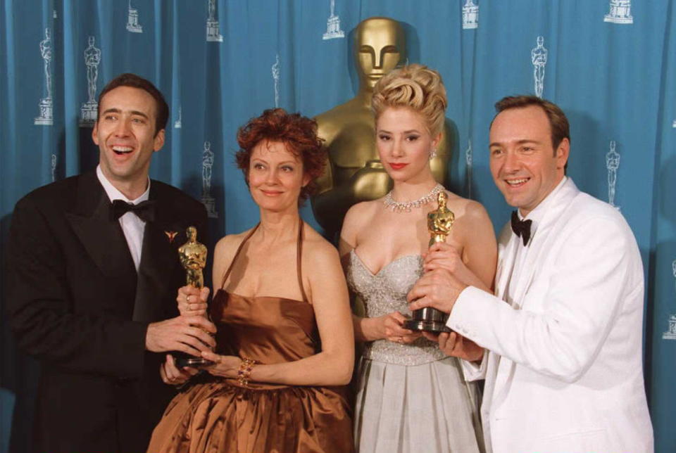 Best Actor winner Nicolas Cage with Susan Sarandon, Mira Sorvino and Kevin Spacey at the 68th annual Academy awards.  (AFP via Getty Images)