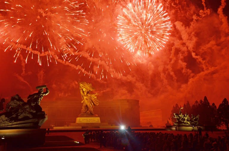 Fireworks explode above the 'Victorious Fatherland War Museum' in Pyongyang, on July 27, 2013