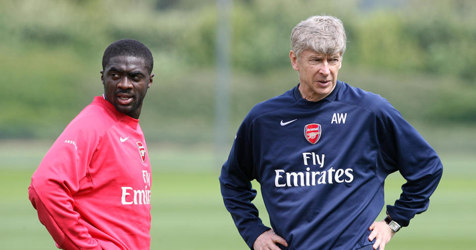   Arsenal defender Kolo Toure and manager Arsene Wenger during an Arsenal training session on May 10, 2007 in St.  Albans, England. 