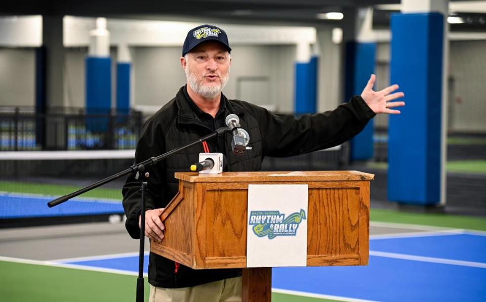 Macon-Bibb County Mayor Lester Miller announces the name of the new indoor pickleball facility on Nov. 28. The Rhythm and Rally Sports and Events Center is two stories featuring 32 courts along with lockers, showers, and a pro shop. Jason Vorhees/\The Telegraph