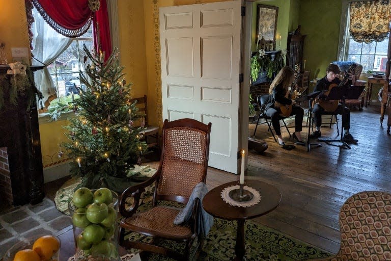 The Wylie House has been freshly decorated with garland and greenery to celebrate in grand, 19th century style.
