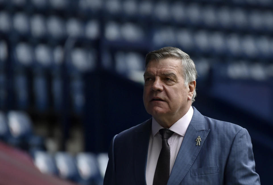 FILE - West Bromwich Albion's manager Sam Allardyce walks before the English Premier League soccer match between West Bromwich Albion and Liverpool at the Hawthorns stadium in West Bromwich, England, Sunday, May 16, 2021. Sam Allardyce has made an unlikely return to Premier League management. The 68-year-old former England coach has been hired by Leeds until the end of the season after the relegation-threatened club fired Javi Gracia. (AP Photo/Rui Vieira, Pool, File)