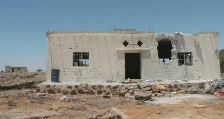 A view shows a damaged house in the Laja area in northeastern Deraa province, Syria in this handout released on June 25, 2018. SANA/Handout via REUTERS