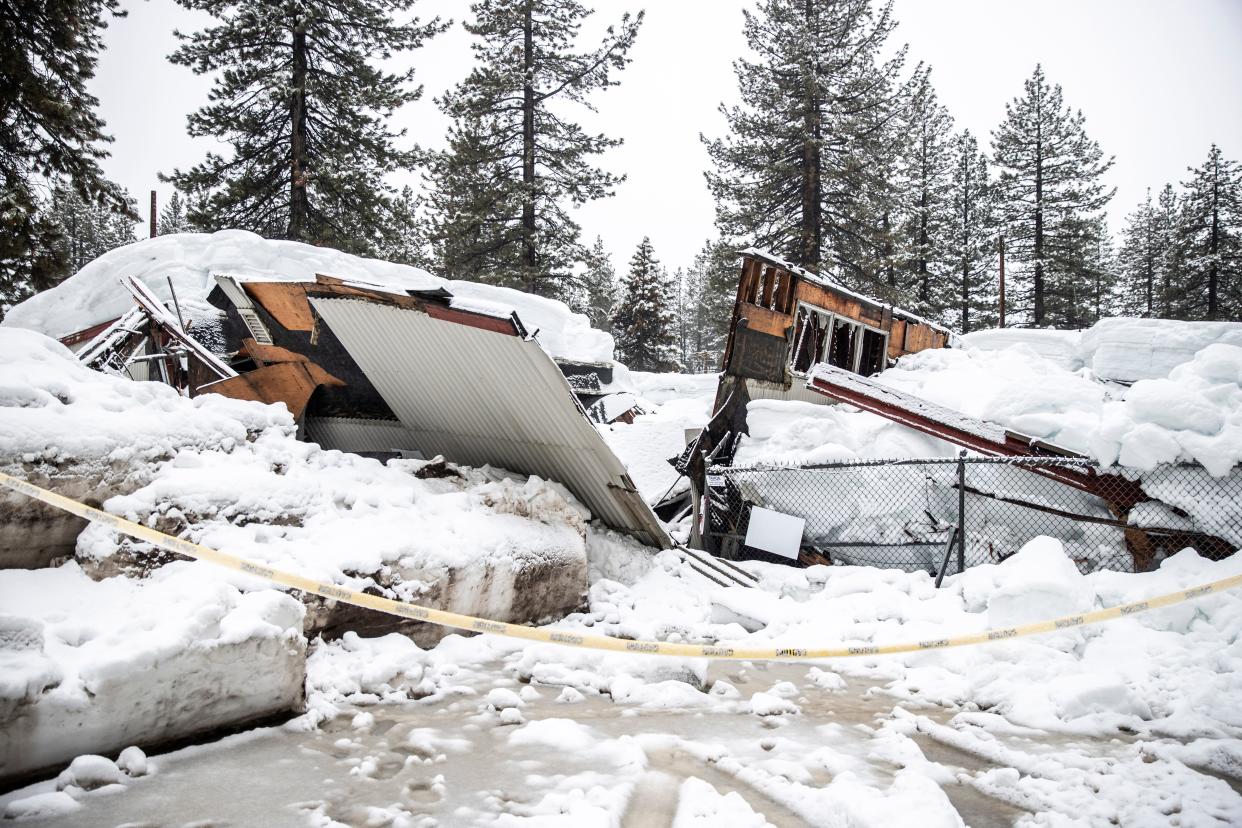 A collapsed building due to the recent snow storms is seen near Dollar Point, Calif. Tuesday, March 14, 2023.