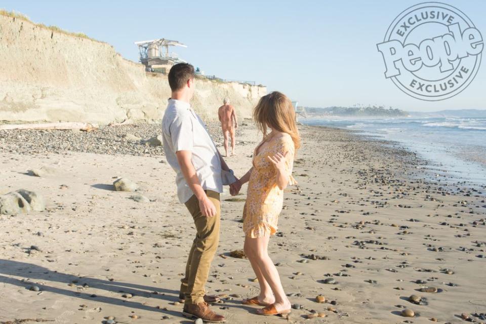 960px x 640px - Man Wearing G-String Hilariously Photobombs Couple's Sunset Engagement  Shoot at the Beach