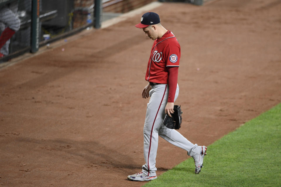 Washington Nationals starting pitcher Patrick Corbin walks to the dugout after he was pulled during the sixth inning of the team's baseball game against the Baltimore Orioles, Friday, July 23, 2021, in Baltimore. (AP Photo/Nick Wass)