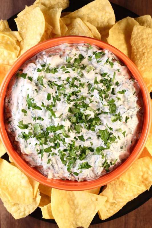 <p>Miss In the Kitchen</p><p>A classic spinach dip made with just a few ingredients and it’s always the hit of any party! Get the potato chips ready. </p><p><strong>Get the recipe: </strong><a href="https://www.missinthekitchen.com/knorr-spinach-dip/" rel="nofollow noopener" target="_blank" data-ylk="slk:Classic Knorr Spinach Dip;elm:context_link;itc:0;sec:content-canvas" class="link rapid-noclick-resp"><strong>Classic Knorr Spinach Dip</strong></a></p>