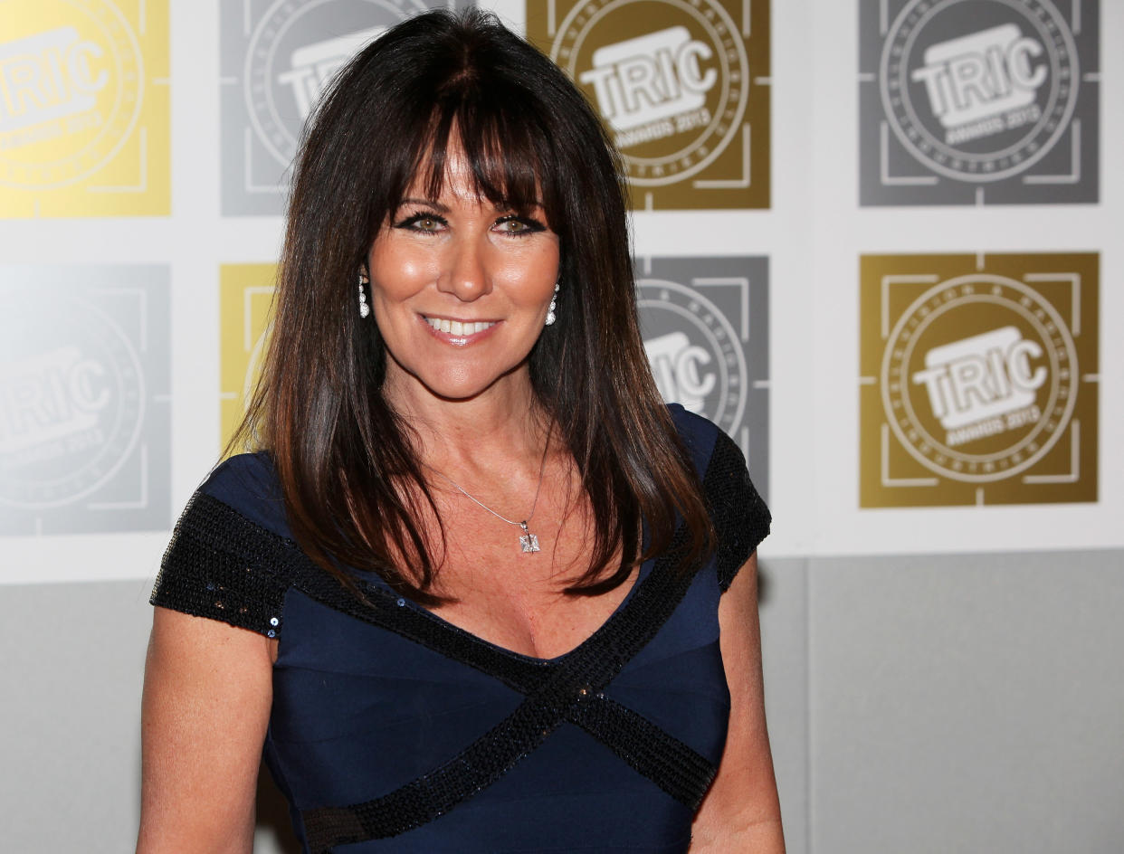 LONDON, ENGLAND - MARCH 12:  (EMBARGOED FOR PUBLICATION IN UK TABLOID NEWSPAPERS UNTIL 48 HOURS AFTER CREATE DATE AND TIME. MANDATORY CREDIT PHOTO BY DAVE M. BENETT/GETTY IMAGES REQUIRED)  Linda Lusardi arrives at the TRIC Television and Radio Industries Club Awards at The Grosvenor House Hotel on March 12, 2013 in London, England.  (Photo by Dave M. Benett/Getty Images)