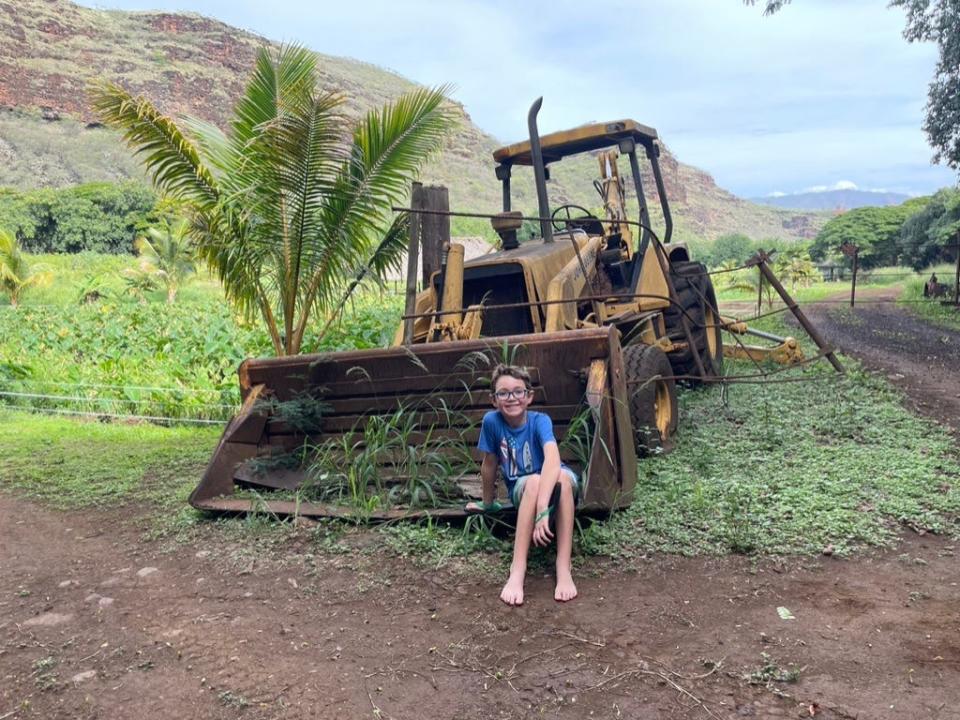 Child playing with a digger