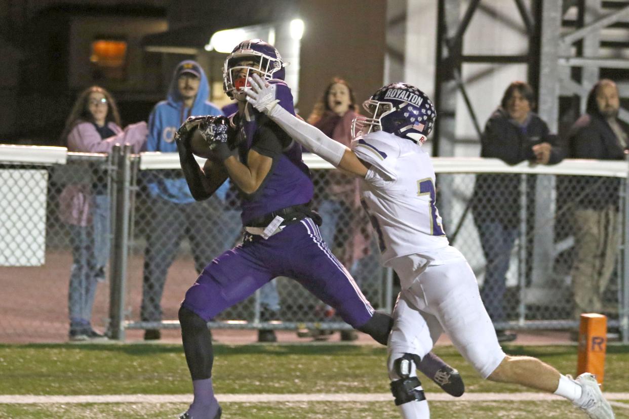 Ross' Bryson Hammer hauls in a touchdown pass.