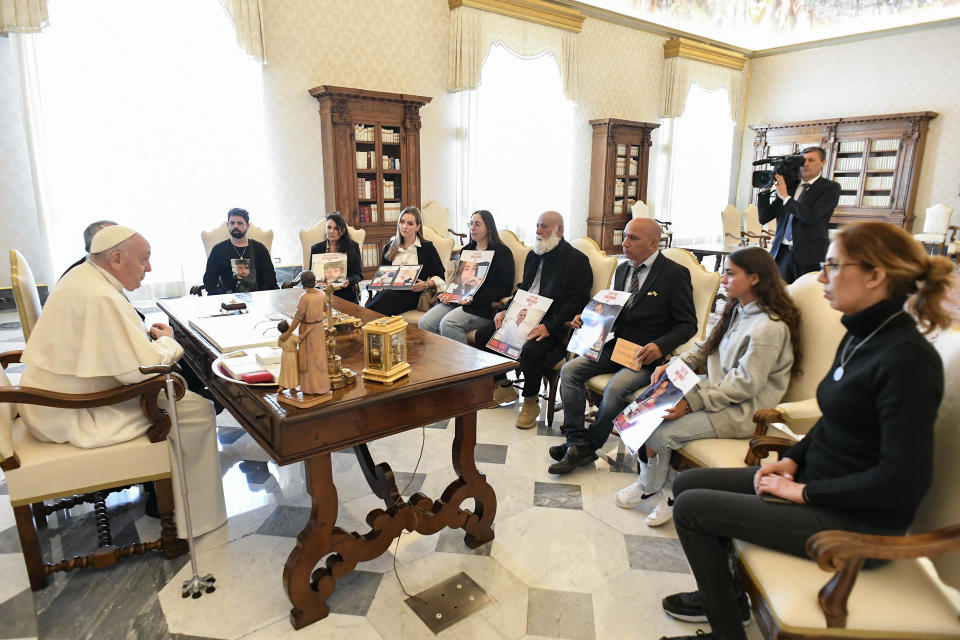 Pope Francis meets with relatives of Israeli hostages being held by Hamas, at the Vatican, Monday, April 8, 2024. Israel sent troops to Khan Younis in December, part of its blistering ground offensive that came in response to a Hamas-led attack on Oct. 7 into southern Israel. Israeli authorities say 1,200 people, mostly civilians, were killed and roughly 250 people taken hostage. (Vatican Media via AP)