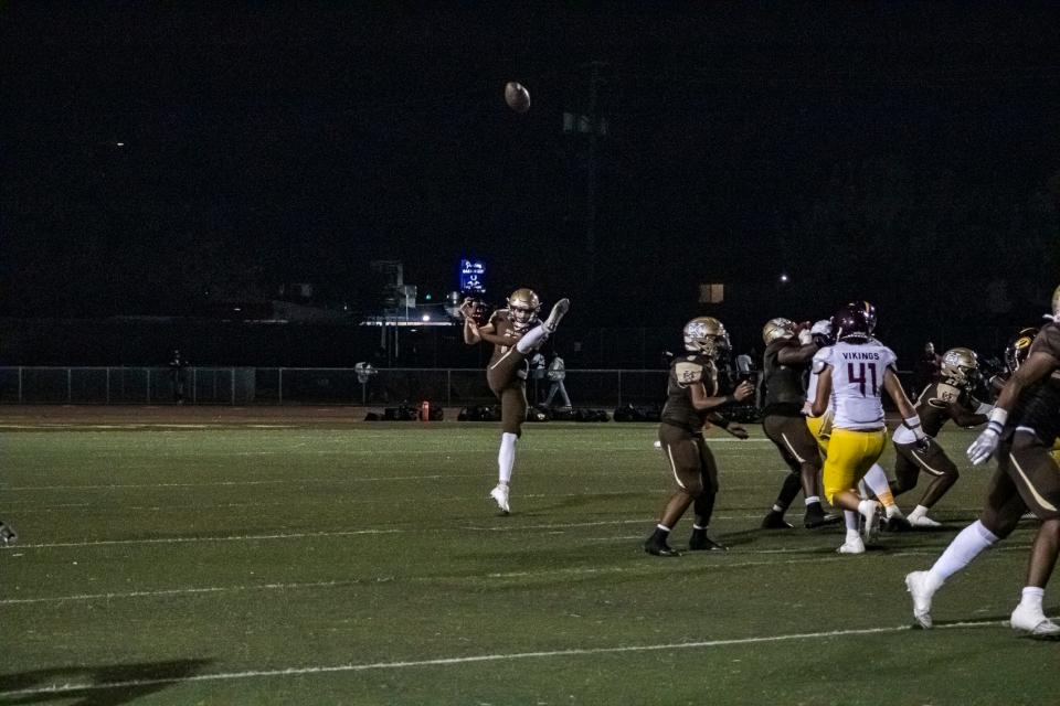 Stagg's Leanos Rhonesimo punts the ball away to Edison during a game at Stagg High School on Sept. 15, 2023.