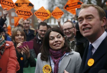 Liberal Democrats winner of the Richmond Park by-election, Sarah Olney, celebrates her victory with party leader Tim Farron on Richmond Green in London, Britain December 2, 2016. REUTERS/Peter Nicholls