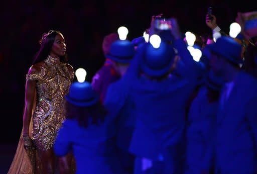 British model Naomi Campbell performs at the Olympic stadium during the closing ceremony of the 2012 London Olympic Games in London