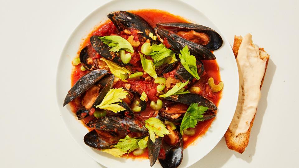 You should be making mussels at home, because they cook in less than 30 minutes, and create an excuse to dip mayonnaise-slathered toasted bread in broth. <a rel="nofollow noopener" href="https://www.bonappetit.com/recipe/mussels-in-spicy-tomato-broth?mbid=synd_yahoo_rss" target="_blank" data-ylk="slk:See recipe.;elm:context_link;itc:0;sec:content-canvas" class="link ">See recipe.</a>