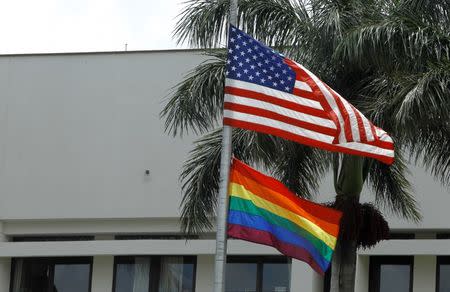 The flag of diversity flutters at the U.S. Embassy in San Jose, Costa Rica, as a show of support for the lesbian, gay, bisexual, and transgender (LGBT) community in Costa Rica, June 3, 2016. REUTERS/Juan Carlos Ulate