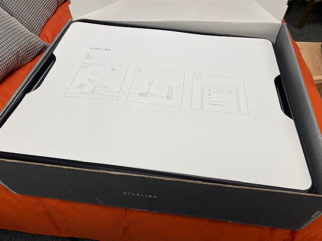 Starlink box with the instructions on top