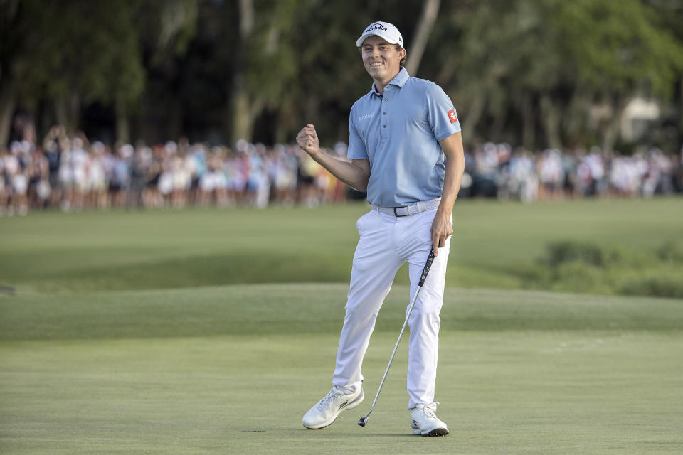 Matt Fitzpatrick, of England, celebrates after winning a three-hole playoff on the 18th green during the final round of the RBC Heritage golf tournament, Sunday, April 16, 2023, in Hilton Head Island, S.C. (AP Photo/Stephen B. Morton)