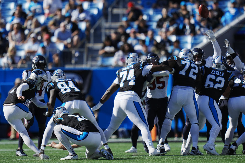 Carolina Panthers' Eddy Pineiro (4) kicks a field goal against the Houston Texans during the second half of an NFL football game, Sunday, Oct. 29, 2023, in Charlotte, N.C. (AP Photo/Rusty Jones)