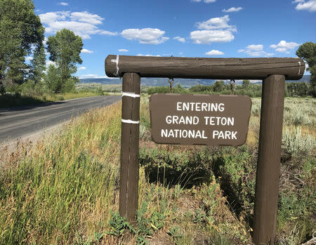 A signpost greets travellers at the Gros Ventre entrance to Grand Teton National Park, in Jackson Hole, Wyoming, U.S, July 12, 2017. Picture taken July 12, 2017. REUTERS/Ann Saphir