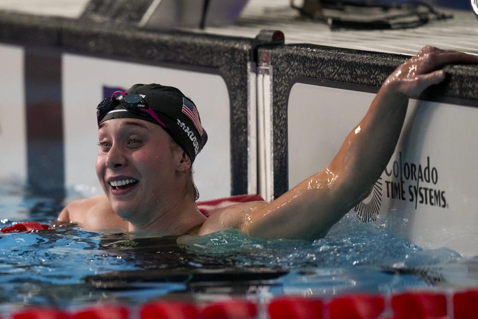 Paige Madden of the United States looks at the board after winning the gold medal in women's 400-meters freestyle at the Pan American Games in Santiago, Chile, Saturday, Oct. 21, 2023. (AP Photo/Silvia Izquierdo)