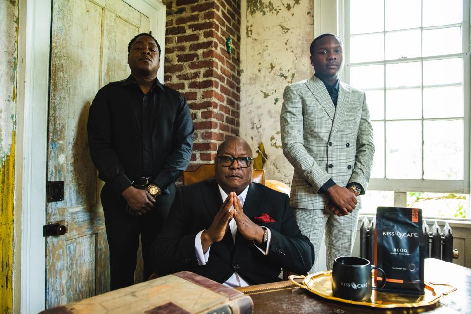 The founders of Kiss Café: Jason Phillips, also known as Jadakiss (left), his father Bob (center) and his son Jaewon (right).