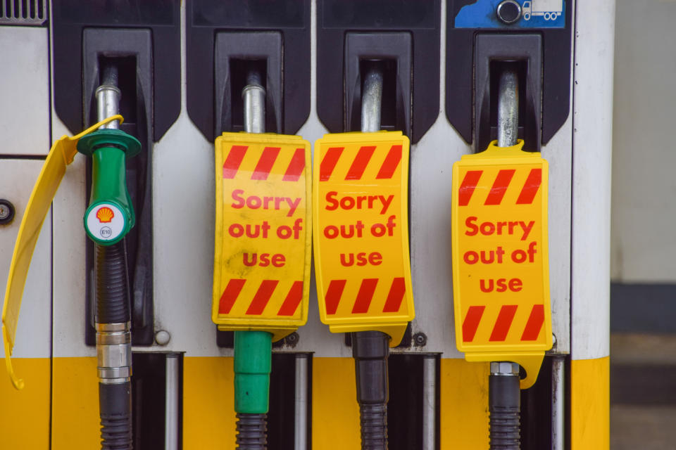 LONDON, UNITED KINGDOM - 2021/10/03: 'Sorry, Out Of Use' signs cover the petrol pumps at a Shell station in Islington. 
Many UK stations have run out of petrol due to a shortage of truck drivers linked to Brexit, along with panic buying. (Photo by Vuk Valcic/SOPA Images/LightRocket via Getty Images)