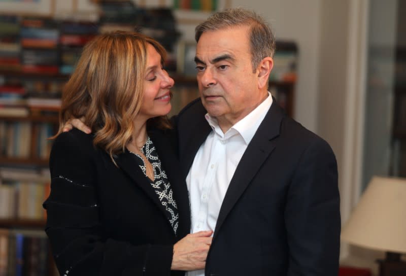 Former Nissan chairman Carlos Ghosn and his wife Carole Ghosn pose for a picture after an exclusive interview with Reuters in Beirut