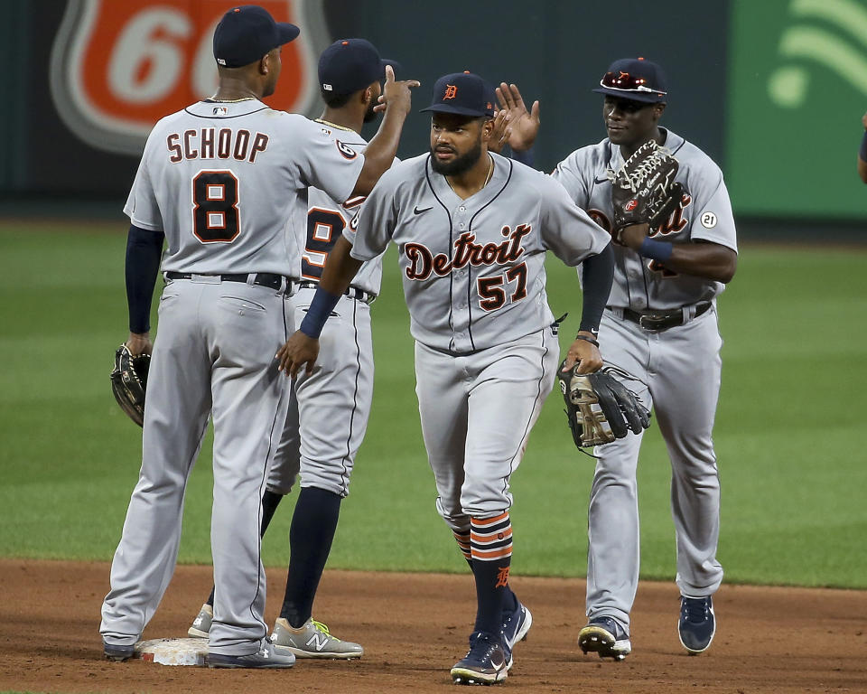 Detroit Tigers' Jorge Bonifacio (57) celebrates with teammates after the Tigers defeated the St. Louis Cardinals 6-3 in the second game of a baseball doubleheader Thursday, Sept. 10, 2020, in St. Louis. (AP Photo/Scott Kane)
