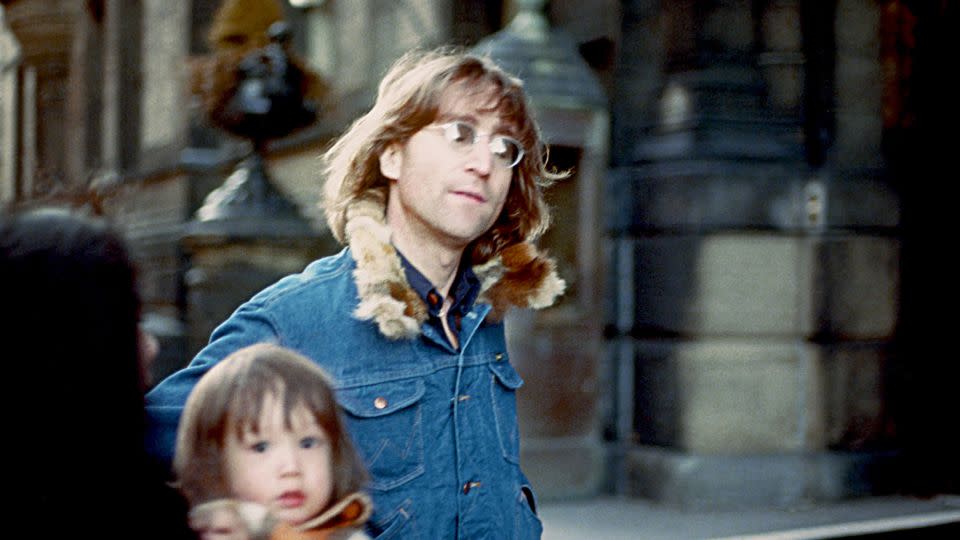 Former Beatle John Lennon is photographed with his wife Yoko Ono and son Sean Lennon in New York three years before he was killed. - Vinnie Zuffante/Archive Photos/Getty Images
